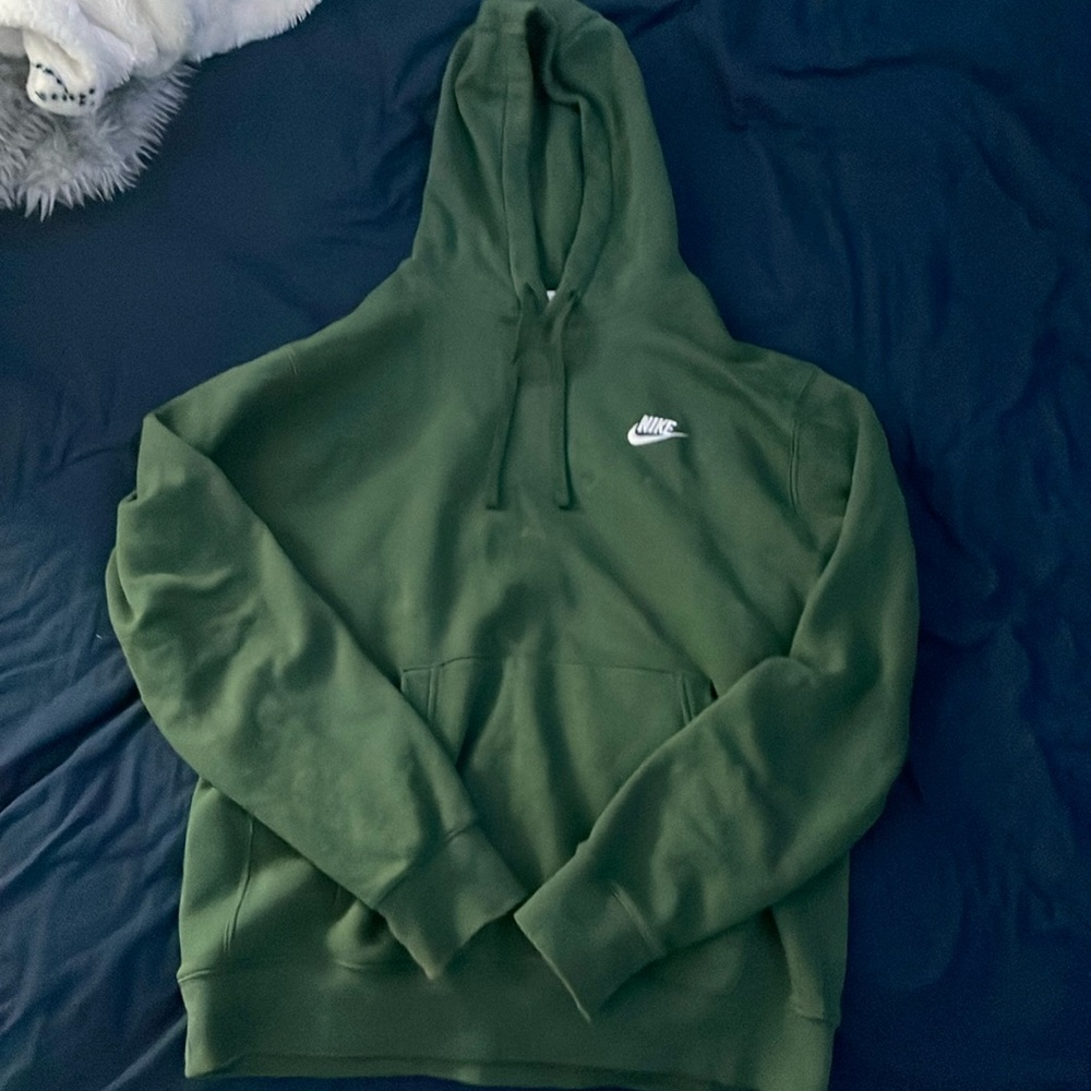 Dark green Nike hoodie, great condition, very comfortable.